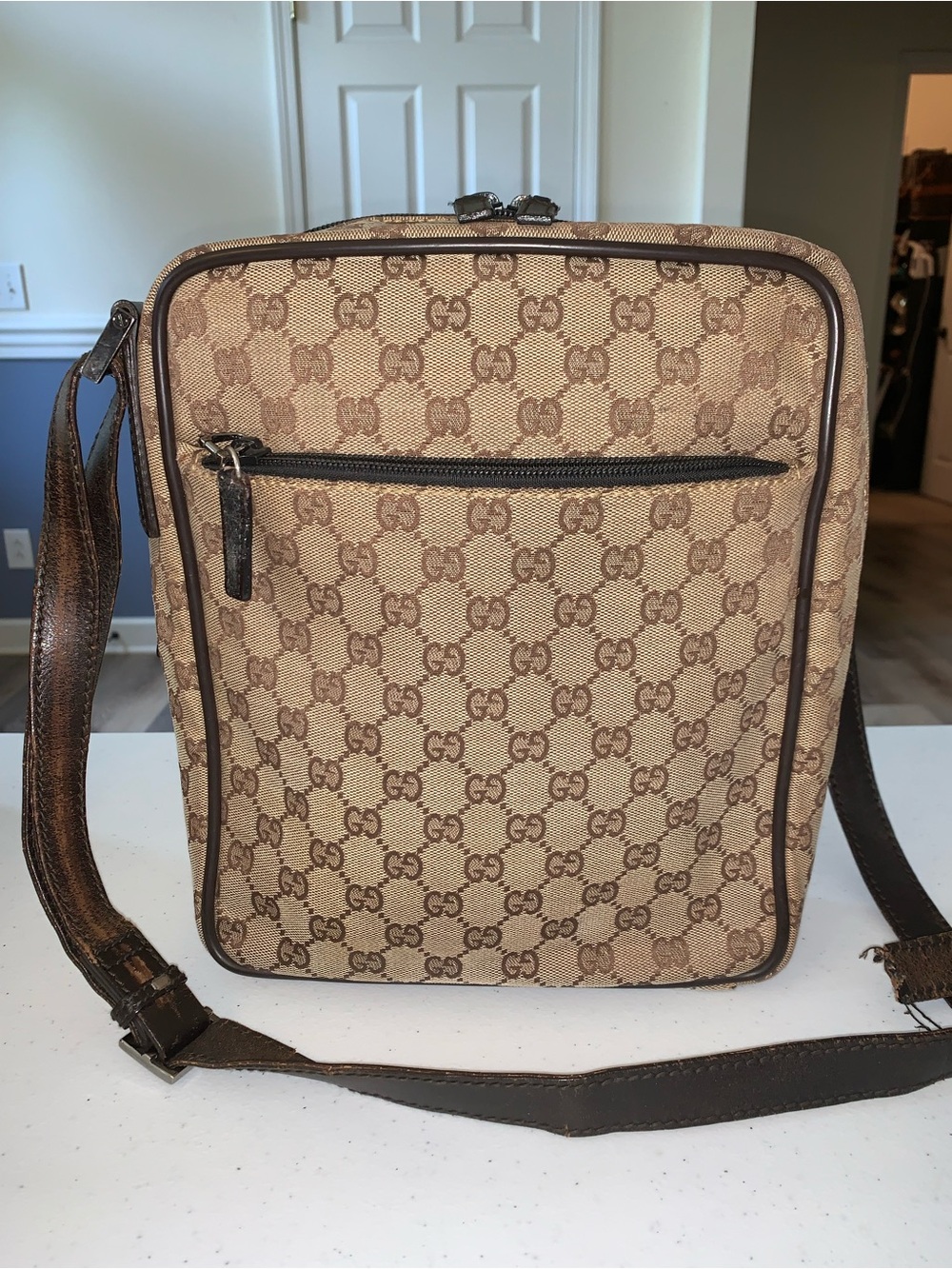 Gucci Beige & Brown GG
Canvas Messenger Bag needs new strap